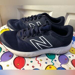 New Balance Dark Blue Sneakers with White Accents.
